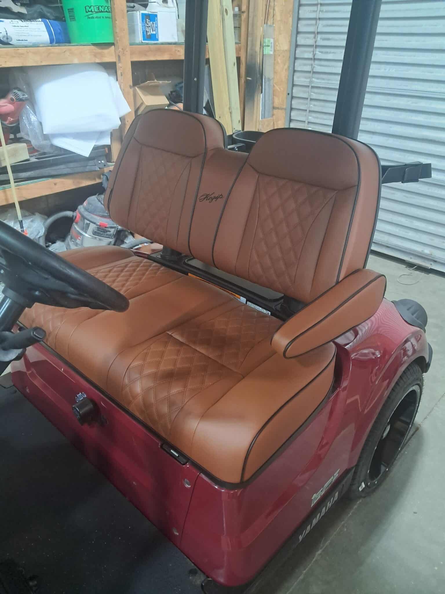 https://dealers.steelenggolfcart.com/wp-content/uploads/2025/11/Kozip-Brown-Front-seat-scaled.jpg
